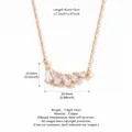 Minimalist gold-plated necklace featuring arrow-cut clear stones in a smile design pendant - Arrow-Shaped Smile Curve Necklace / Gold