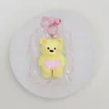 Jouet squishy ours en peluche en silicone à rebond lent jaune, vue de la variante - Ours en Couche / Jaune-Rose