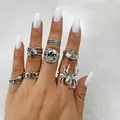 Ensemble de bagues punk vintage avec des motifs de crâne, d'araignée et de serpent en argent. - Bague 33623-S