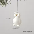 Elegant white ceramic owl Christmas tree ornament with gold beak detail and silver string - Owl