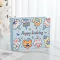 Detailed shot of cute cartoon rabbit and bear patterns on a blue birthday gift bag - Small (19.5x8.5x14.5cm) / Blue