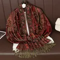 Close-up of luxurious red faux cashmere shawl featuring intricate golden paisley jacquard patterns. - Jacquard Tassel Shawl (T705-11) / 70x190cm / Deep Red (T705-11)
