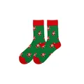 Dettaglio dei calzini natalizi verdi con un motivo ripetitivo di Babbo Natale pixelato. - Stile 13 (Babbo Natale Pixel)