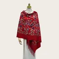 Elegant red embroidered cashmere-like shawl with floral patterns and tassels on a mannequin. - 70cm x 200cm / Red