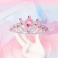 Exquisite pink crystal princess tiara for girls shown on white jewelry hand display - Simple Pink Mini Crown / Pink