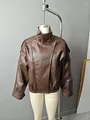 Oversized brown faux leather jacket on mannequin featuring high neck and asymmetric design. - S / Tops / Brown