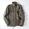 Heavyweight cotton military utility jacket with multiple pockets for men in olive green - M / Tops / Light Army Green