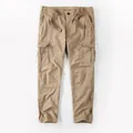 American vintage khaki cotton cargo pants for men with a loose straight leg fit - 38 / Bottoms / Khaki