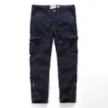 Vintage navy blue men's cargo pants in washed cotton with multi-pockets and leg zippers. - Sapphire Blue