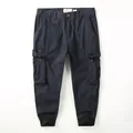 Men's navy blue cropped cargo pants featuring multiple side pockets and comfortable ribbed cuffs - 38 / Bottoms / Blue