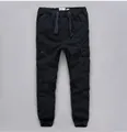 Pantaloni cargo neri pesanti da uomo con vita elastica e grandi tasche laterali - Nero