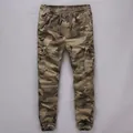 Classic men's camouflage cargo joggers with elastic waist and drawstring detail. - Desert Camouflage