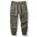 Vintage men's cargo joggers with large side pockets and loose fit in olive green. - 38 / Bottoms / Army Green