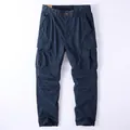 Classic navy blue cotton cargo pants with multi-pocket design and loose straight fit - 38 / Bottoms / Crane Blue