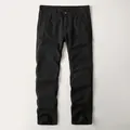 Premium black men's casual cotton trousers featuring classic straight leg design - Black