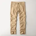 Classic men's khaki cotton cargo pants featuring a straight leg and durable washed finish - Khaki