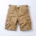 Vintage men's khaki cotton cargo shorts with multi-pockets and waist adjustment straps. - 28 / Bottoms / Khaki