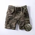 Men's loose fit camouflage cargo shorts with button fly and matching belt detail - 28 / Bottoms / Desert Camouflage