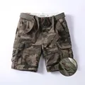 Men's loose fit camouflage cargo shorts with button fly and matching belt detail - 28 / Bottoms / Desert Camouflage