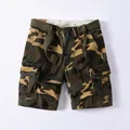 Men's loose camouflage cargo shorts with woven belt and functional button fly detail - 28 / Bottoms / Yellow Camouflage