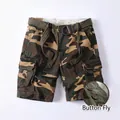 Men's loose camouflage cargo shorts with woven belt and functional button fly detail - 30 / Bottoms / Yellow Camouflage