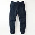 Men's retro navy blue fleece-lined cargo pants with pleated knee details and jogger cuffs - 38 / Bottoms / Sapphire Blue