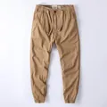 Vintage khaki cotton jogger pants for men with drawstring waist and elastic cuffs - S / Bottoms / Dark Khaki
