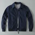 Chaqueta bomber acolchada para hombre en azul marino con forro de cuadros. - S / Tops / Azul zafiro