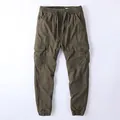 Men's vintage olive green cargo joggers with drawstring waist and washed cotton fabric - S / Bottoms / Dark Army Green