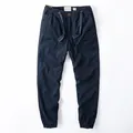 Men's vintage navy blue cotton cargo joggers with drawstring waist and elastic cuffs - S / Bottoms / Dark Blue