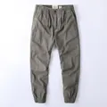 American vintage men's cotton cargo joggers with elastic waist and drawstring in olive gray - Light Army Green
