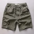 Casual army green cotton shorts for men featuring an elastic drawstring waist and side pockets - S / Bottoms / Light Army Green