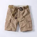 Casual khaki cargo shorts for men featuring a woven belt and classic button fly design - 38 / Bottoms / Light Khaki