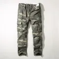 Men's vintage fleece-lined camouflage cargo pants featuring a relaxed fit and multiple pockets - 38 / Bottoms / Green Camouflage