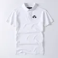 Breathable white men's cotton short-sleeved Polo shirt featuring a stylish chest logo - S / Tops / White