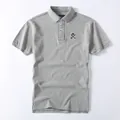 Premium classic grey men's cotton short-sleeve Polo shirt featuring an embroidered chest logo - S / Tops / Gray