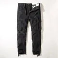 Vintage black multi-pocket cargo pants for men featuring warm fleece lining for winter - 38 / Bottoms / Black