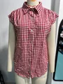 Detailed view of red and white gingham sleeveless button-down shirt displayed on mannequin - S / Tops / Red Real Photo