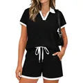 Detail view of women's black two-piece sporty set with white polo collar and trim - S / Top And Bottom / Black