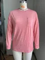 Roze gemêleerd damesshirt met lange mouwen en borstzak getoond op een mannequin - S / Tops / Roze
