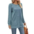 Detail view of a women's light blue ribbed knit top with puff sleeves and pockets - Blue