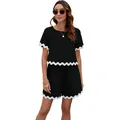 Stijlvolle zwarte tweedelige set met witte geschulpte rand, korte mouwen en een short. - S / Top en Broek / Zwart