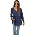 Vista dettagliata del top blu navy con scollo a V, vita a peplo e polsini a pieghe - Blu navy
