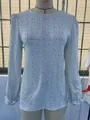 Women's long-sleeved floral print top featuring a crew neck and smocked fabric texture - S / Tops / Teal