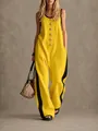 Detail of fashionable color-block sleeveless jumpsuit featuring creative gold buttons. - S / Top And Bottom / Yellow