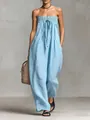 Close-up showing the smocked bodice and tie detail of light blue strapless jumpsuit - S / Sky Blue
