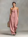 Pink strapless wide-leg jumpsuit with smocked bust and decorative front drawstring tie - S / Pink