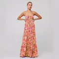 Abito lungo floreale bohémien con spalline sottili, apertura sul davanti e gonna a balze. - Taglia S / Sopra e Sotto / rosa arancio
