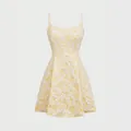 Sleeveless A-line short dress featuring 3D white floral patterns on a yellow background. - S / Tops / Apricot