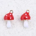 Detailed view of red and white enamel mushroom charms for DIY jewelry crafts - Small Mushroom / 1 Piece